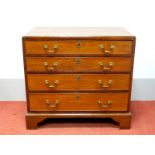 A Late XVIII Century Mahogany Chest of Drawers, the top with small moulded edge, upper drawer fitted