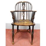 A XIX Century Ash and Elm Windsor Chair, with hooped back and pierced splat, turned legs united by