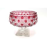 A Mid XX Century Cut Glass Ruby Flashed Bowl, of circular form, raised on a knopped stem and stepped