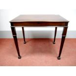 A Late XVIII Century Mahogany Reading Table, with rectangular top, moulded edge and candle slides to