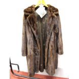 A Ladies Full Length Brown Mink Coat, with collar and toggle and frog fastening, 107cm long.