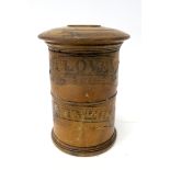 A Mid XIX Century Sycamore Two-Section Spice Tower, of cylindrical form, applied with paper