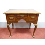 A Mid to Late XVIII Century Oak Lowboy, with a rectangular top and three small drawers above