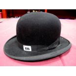 A G.A. Dunn & Co. Ltd. Black Bowler Hat, pleated oyster silk lining with leather inner rim, size 7.