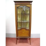An Edwardian Inlaid Mahogany Display Cabinet, with stepped pediment over glazed door to two internal