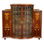 A Shapland & Petter Ltd. Art Nouveau Mahogany Bow Fronted Display Cabinet, the low back with