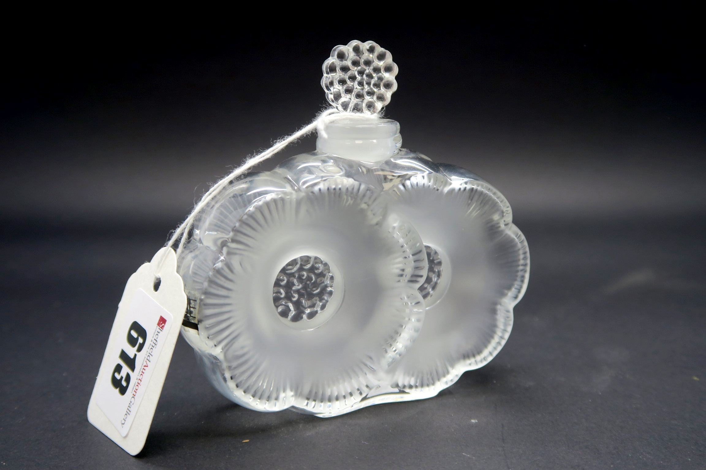 A Lalique Glass Scent Bottle and Stopper, modelled in the 'Deux Fleurs' design,