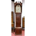 An XVIII Century Oak Eight-Day Longcase Clock, the arched dial with Roman numerals and two