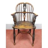 A XIX Century Ash and Elm Windsor Chair, with hooped back and pierced splat, turned legs united by