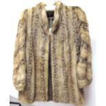 A Ladies Beige Mink Three Quarter Length Coat, with very attractive darker 'tail tip' detail forming