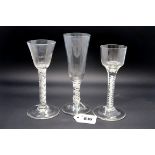 A Mid XIX Century Tall Ale Glass, the tapered bowl raised on a short white enamel twist stem and