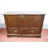 An XVIII Century Oak Mule Chest, the top with moulded edge over three panel front over two small