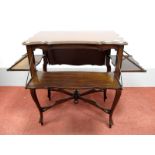 An Early XX Century Mahogany Occasional Table, with fall flaps, sabre legs united by 'X'