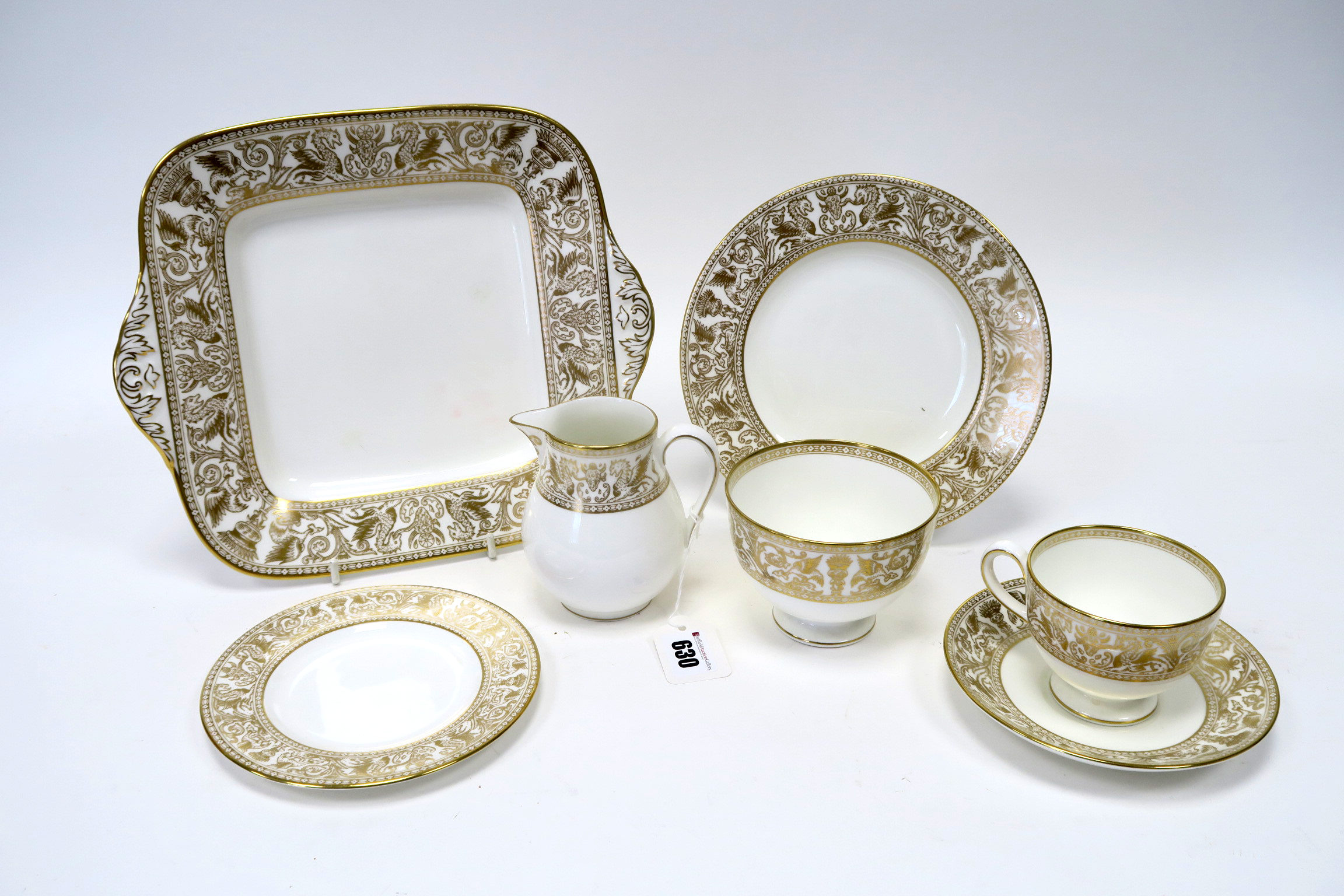 A Wedgwood Porcelain 'Gold Florentine' Tea Service, decorated with a border of dragons, phoenix