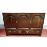 An XVIII Century Coffer, adapted to two door cabinet over two drawers, on stile feet, 88cm high,