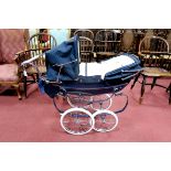 A Silver Cross Twin Dolls Pram, classic vintage styling, navy high gloss finish, coach built with