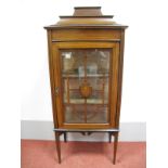 An Edwardian Inlaid Mahogany Display Cabinet, with a raised top, glazed door to two internal