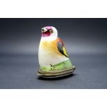 An Early XIX Century South Staffordshire Enamel Bonboniére, modelled in the form of a bird on a