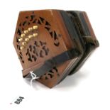 A Lachenal, London Concertina, the mahogany fret cut hexagonal end panels with twenty-one bone