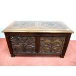 An Early XX Century Carved Oak Blanket Box, with twin panel top, carved with the initials 'E.A.' and