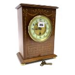An Edwardian Mahogany and Satinwood Inlaid Mantel Clock, of rectangular form, the circular brass and
