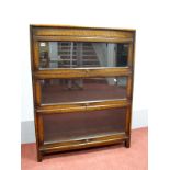 A XX Oak Three Sectional Glazed Bookcase, impressed 'Gunn' to centre section, 112cm high, 87cm wide.