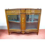 An Early XX Century Mahogany Serpentine Shaped Display Cabinet, with three-quarter gallery, two