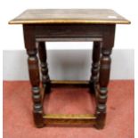 A Late XVII Century Style Joined Oak Joint Stool, the rectangular top with moulded edge, on turned