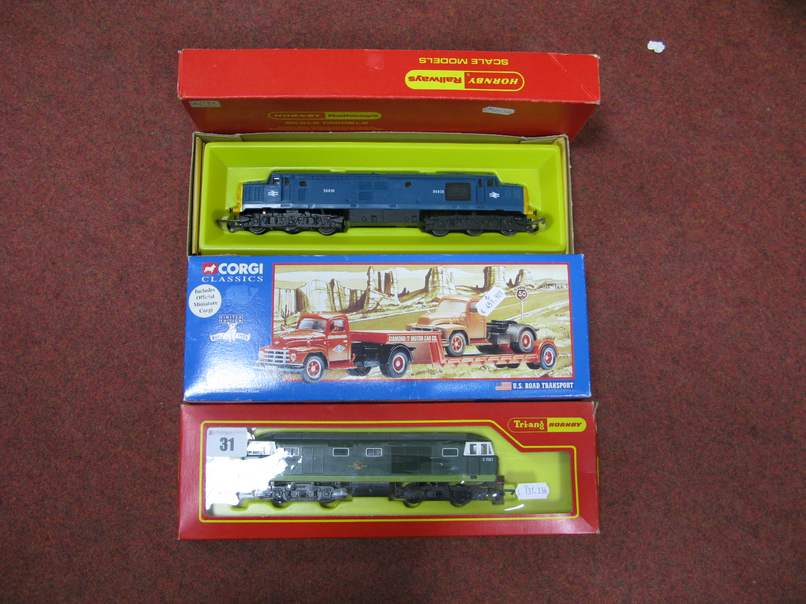 Two "OO" Scale Model Railway Diesel Locomotives, by Hornby. One Class 35 Hymek in green and one