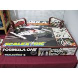 A boxed Scalextric Formula One Racing Set, including one Brabham, one Williams, track, unchecked,