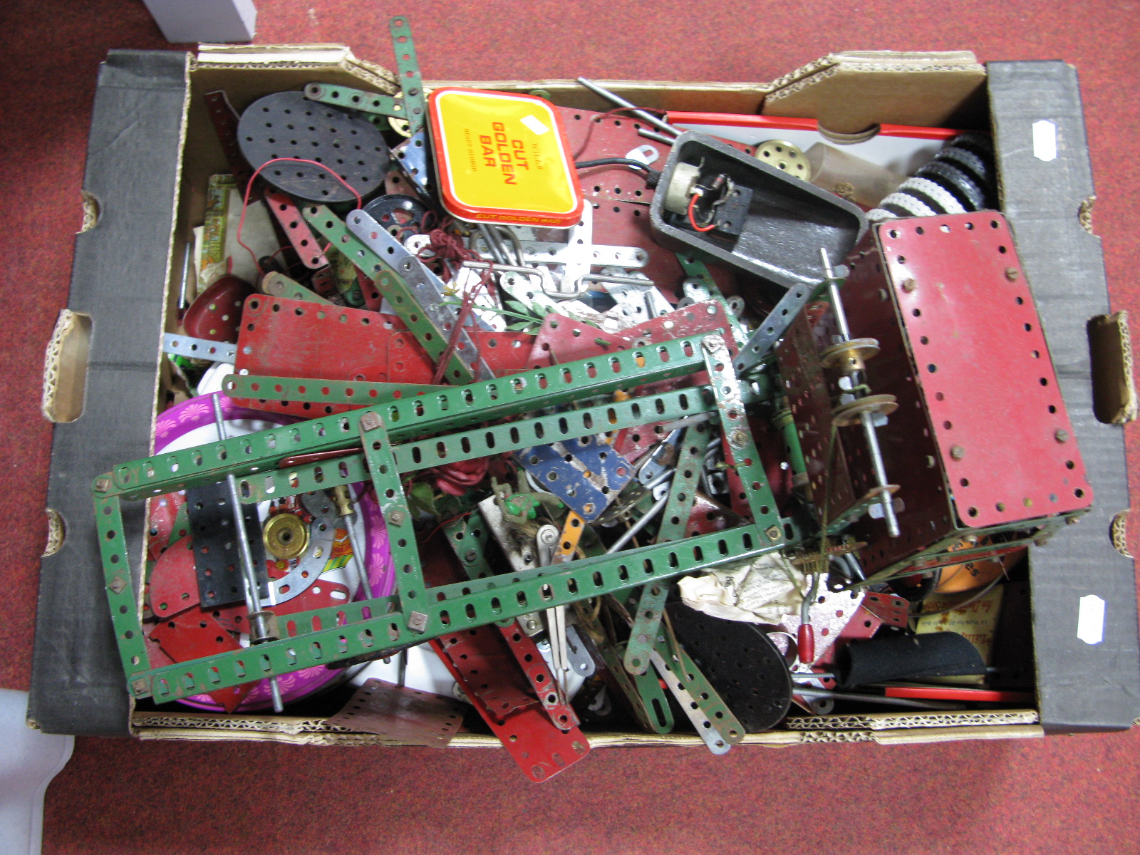 A Quantity of Assorted Meccano Components predominantly Red/Green Type, playworn.