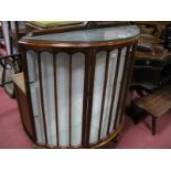 A 1930's Walnut Bow Front Display Cabinet, on squat cabriole Legs, (one pane damaged), satin