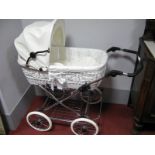 An Eichorn Pram, classic vintage styling, chrome chassis, complemented with white hand made wicker