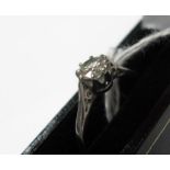 A Platinum Single Stone Diamond Ring, the brilliant cut stone eight claw set.