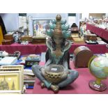 A Circa Mid XX Century Plaster Display Lamp as a Seated Indian Lady.