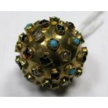 A 9ct Gold Spherical Pendant, raised collet set allover with coloured cabochons.