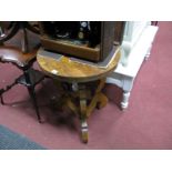 A Heavy Oak Occasional Table, circular top, on shaped tripod legs, in the Continental style, with