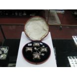 A Set of Four Hallmarked Silver Salts, each of rounded square form raised on four lion mask paw