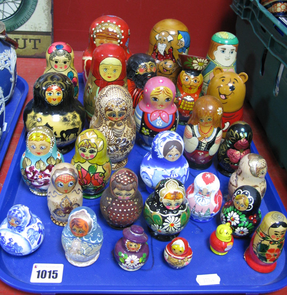 A Nice Collection of Over Twenty-Five Russian Doll Babushka's, varying sizes and designs including