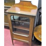 An Edwardian Mahogany Glazed Cabinet, with shaped gallery back and top, ebony and boxwood stringing,