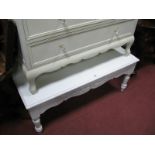 AWhite Painted Coffee Table, with a rectangular top, shaped apron, with applied decoration.