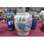 A Poole Pottery Vase, hand painted floral decoration; together with a pair of "Troy" speckled blue