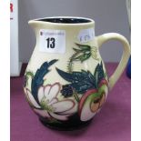 A Moorcroft Pottery Jug, painted in the Bramble Dell pattern by Nicola Slaney, limited edition no.