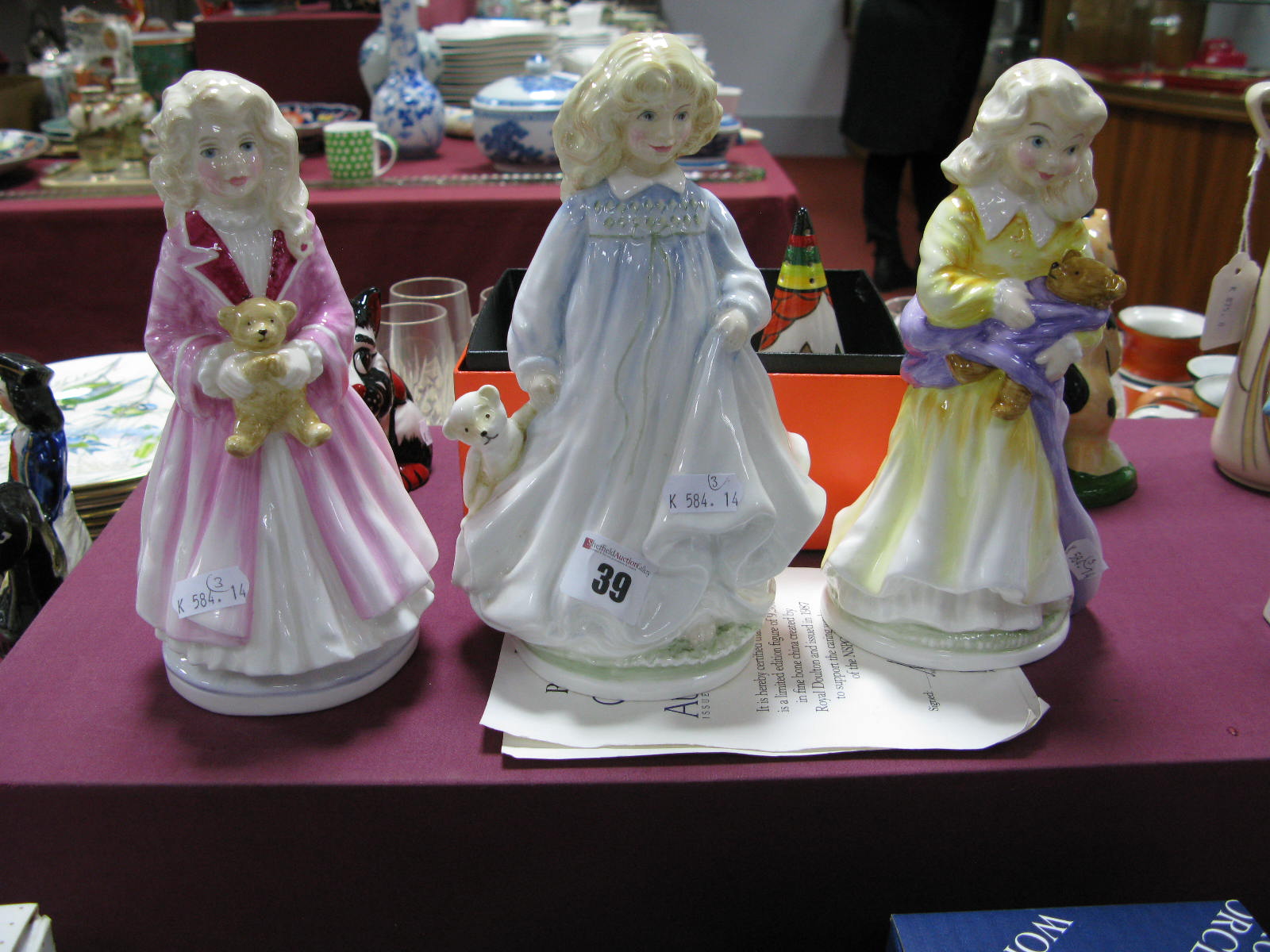 Royal Doulton Figurines - Faith HN3082, Hope HN3061 and Charity HN3087, each produced to support the