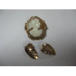 An Oval Cameo Brooch, depicting female profile, stamped "9ct"; together with a pair of Modernist