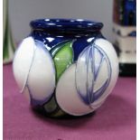 A Moorcroft Pottery Vase, painted in the White Rose pattern by Kerry Goodwin, shape 55/2, painted