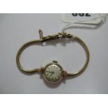 Cyma; A 9ct Gold Cased Ladies Wristwatch, the signed dial with baton markers, to integral snake link