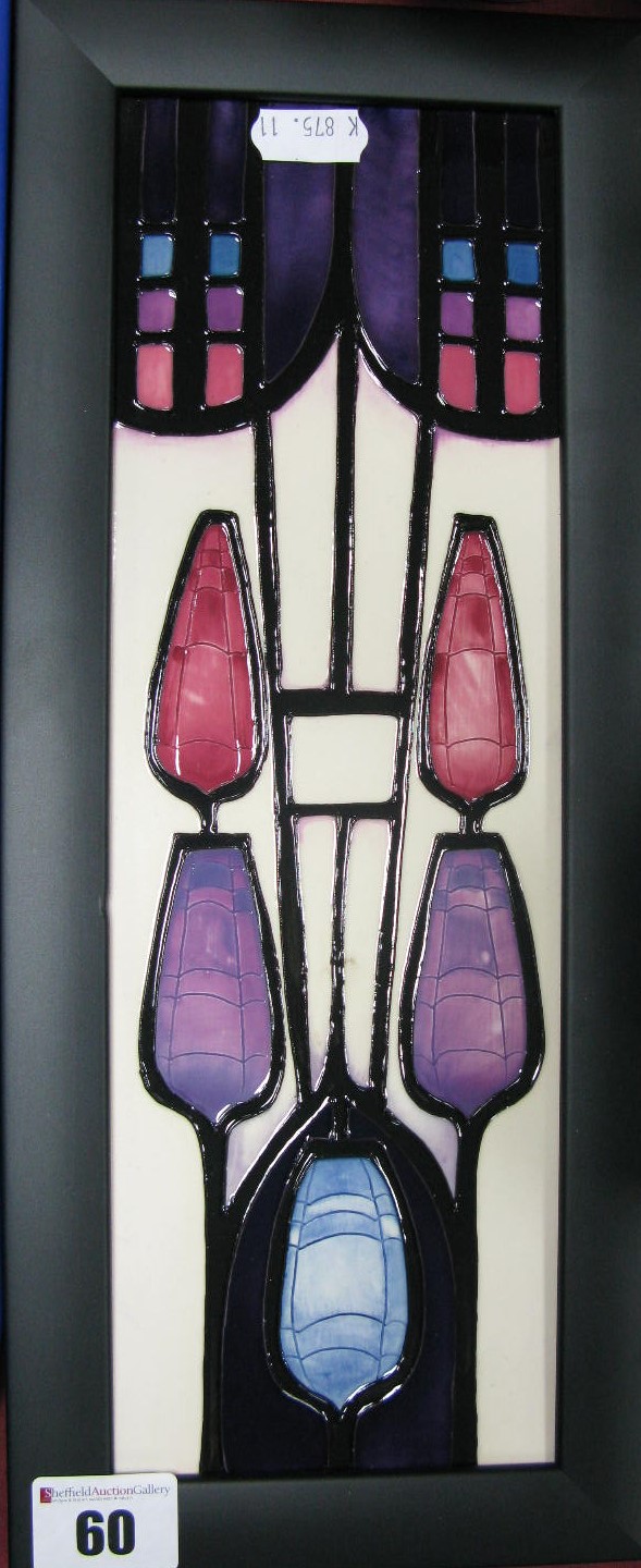 A Moorcroft Pottery Plaque, painted in the Unity pattern by Emma Bossons, 30 x 9.5cm, framed.