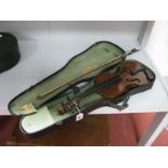 An Early XX Century Violin, with two piece back, length of back 34cm, together with bow and case.