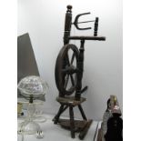 A Spinning Wheel, circa 1900, having spindle supports.